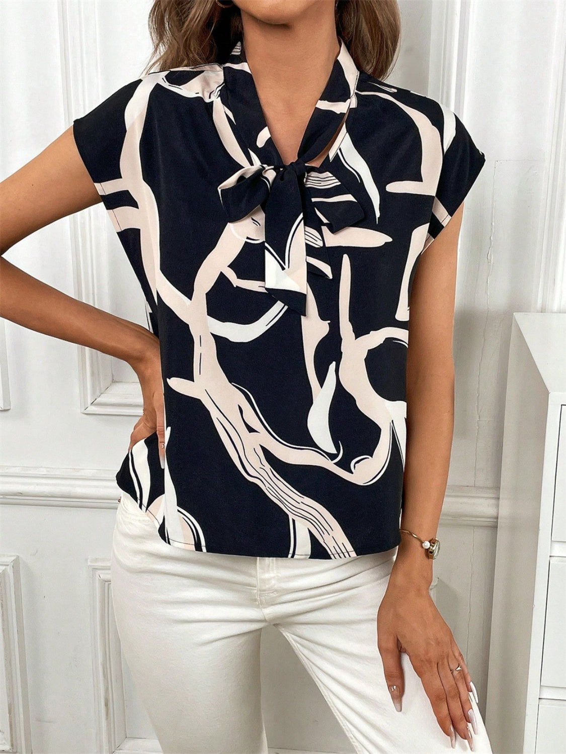 Printed Tie Neck Cap Sleeve Blouse